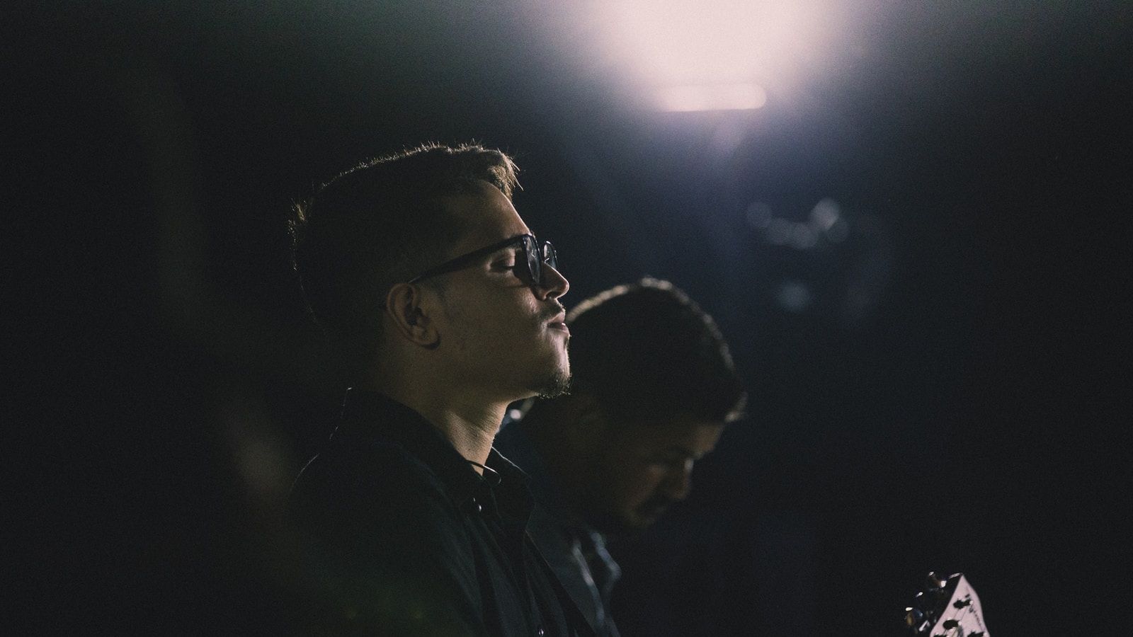 man in black framed eyeglasses